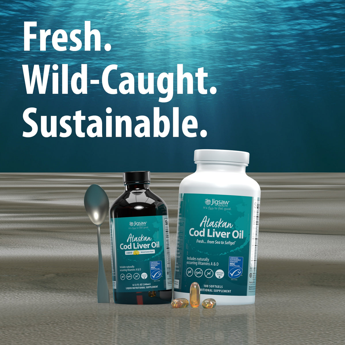 Jigsaw Alaskan Cod Liver Oil bottles and capsules with spoon, shown underwater with text: Fresh. Wild-Caught. Sustainable.
