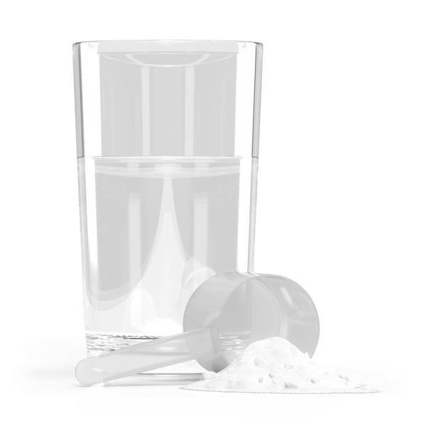 Jigsaw Collagen Boost powder and scoop next to a glass of water