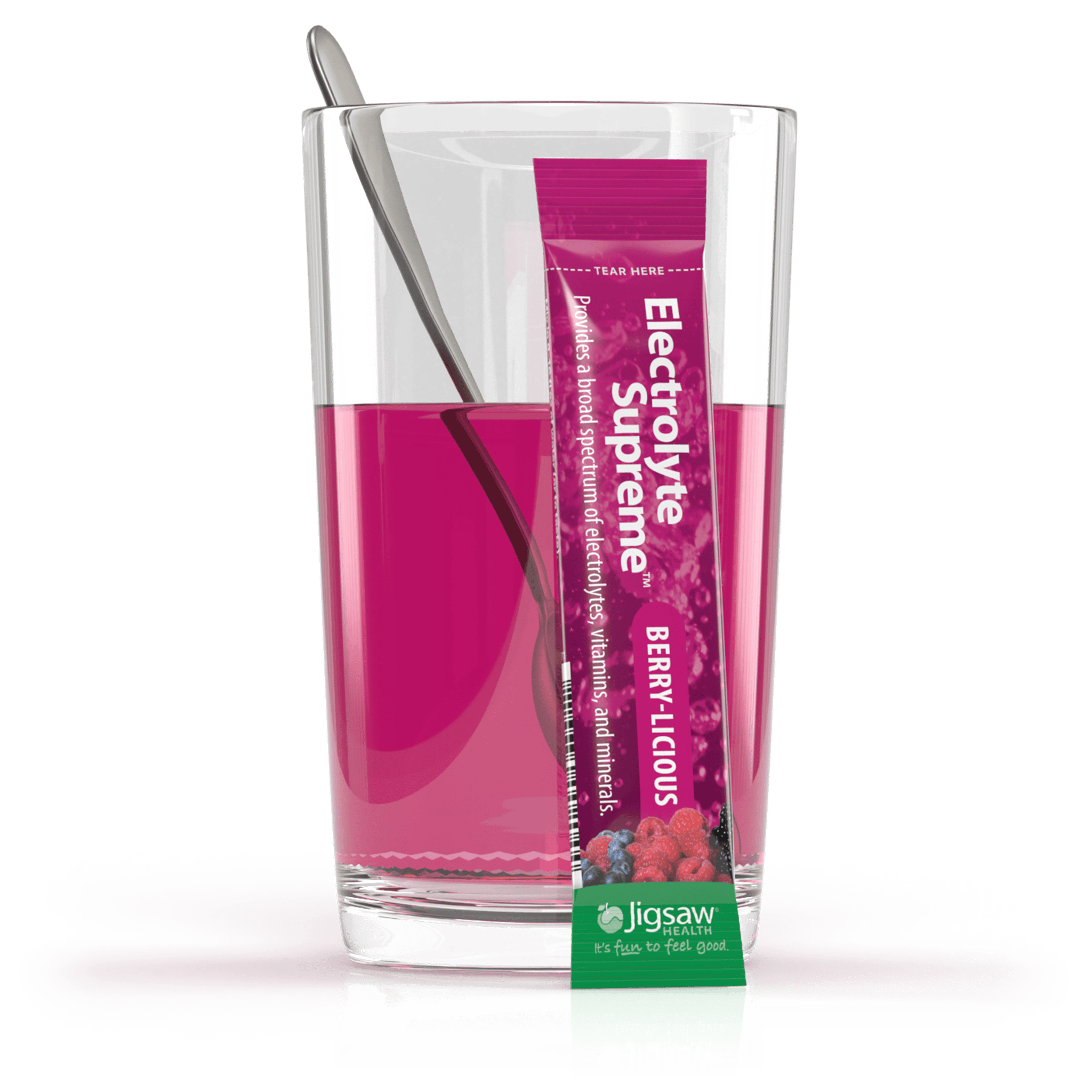 Jigsaw Electrolyte Supreme berry-licious packet in front of glass of water with matching powder mixed in.