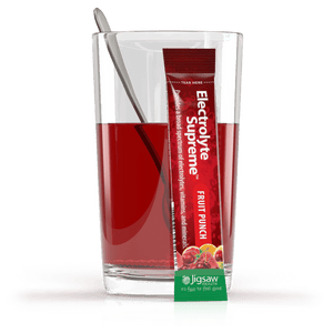 Electrolyte Supreme Fruit Punch Packet and Glass