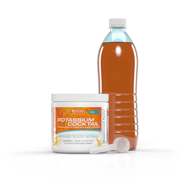 Jigsaw Potassium Cocktail orange jar and water bottle